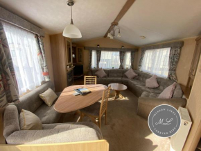 Coral Beach - Row 73 Van 2, central heating, WiFi, bed linen - Meadow Lakes Caravan & Lodge Hire